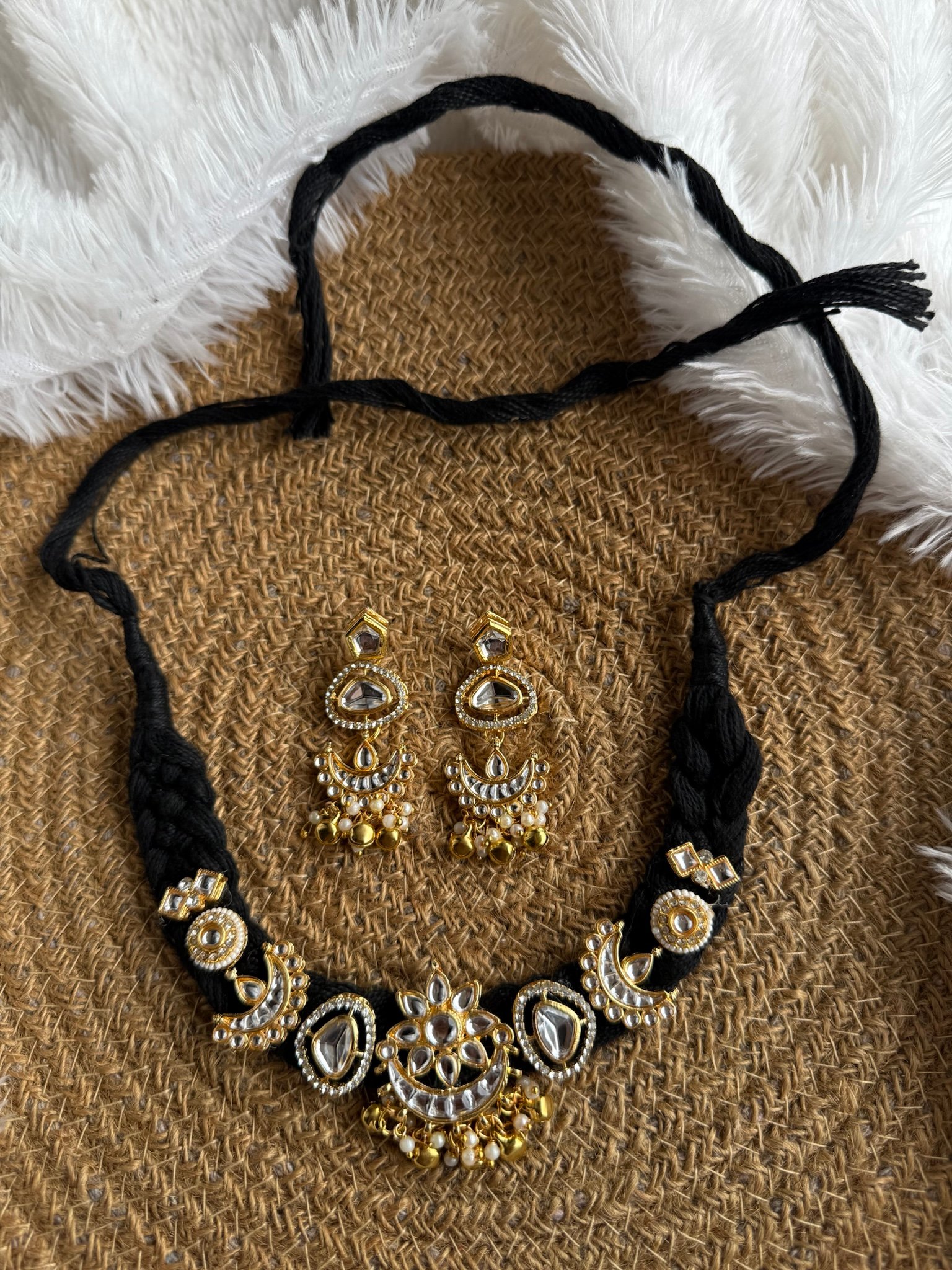 2A7214C3 3504 49CE B06E 5A06B7B16E16 Black thread choker and earring with golden kundan Black thread choker and earring with golden kundan